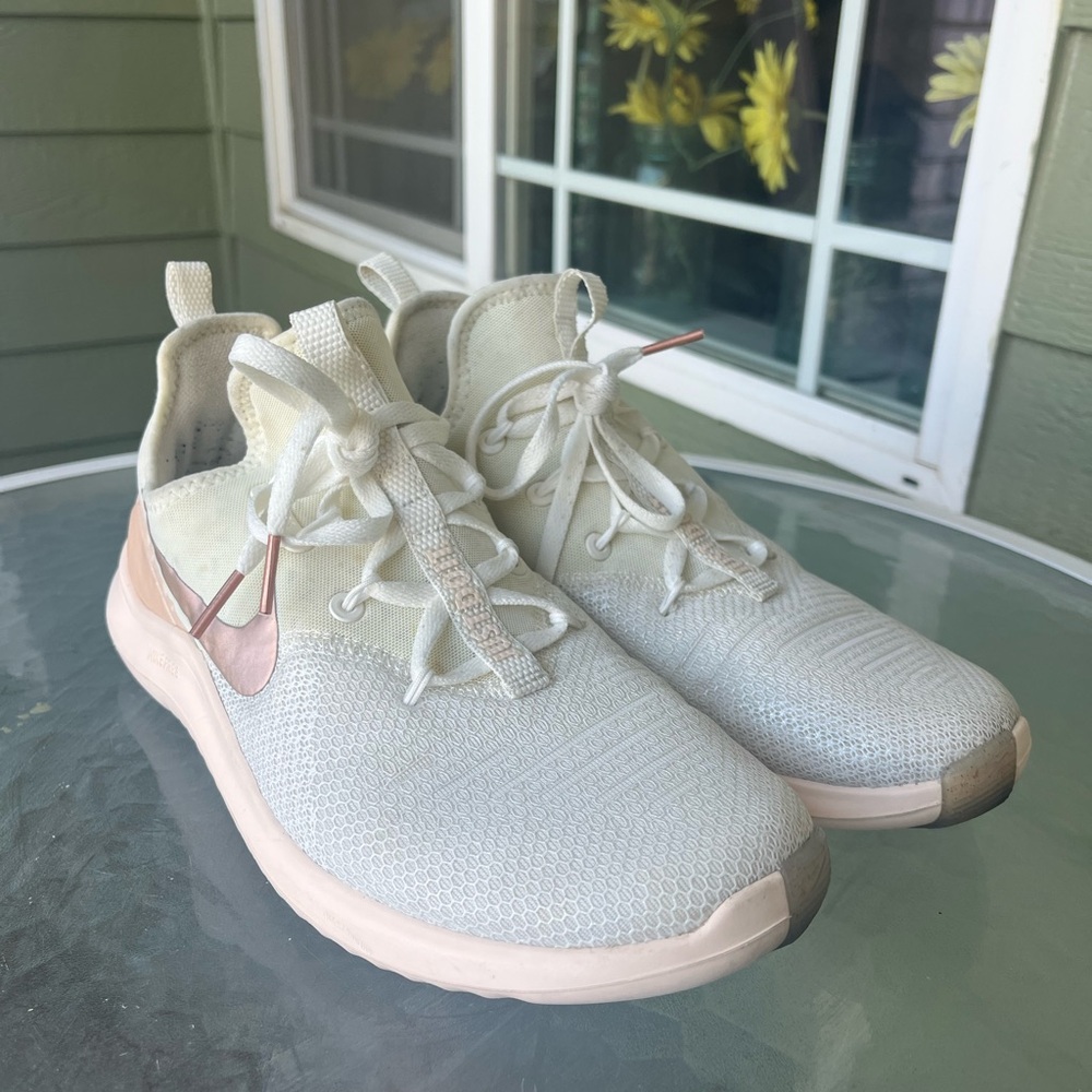 Nike White and Pink Sneakers with Minimalist Design